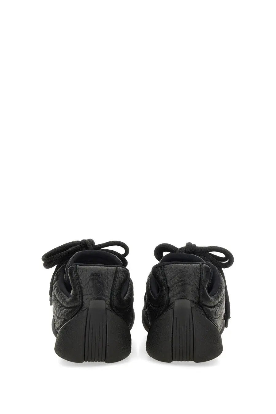 Black quilted leather sneakers with chunky sole and tied laces alexander mcqueen men’s flexion sneaker black