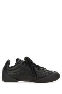 Alexander McQueen men’s flexion sneaker black with quilted textured upper and sleek modern design