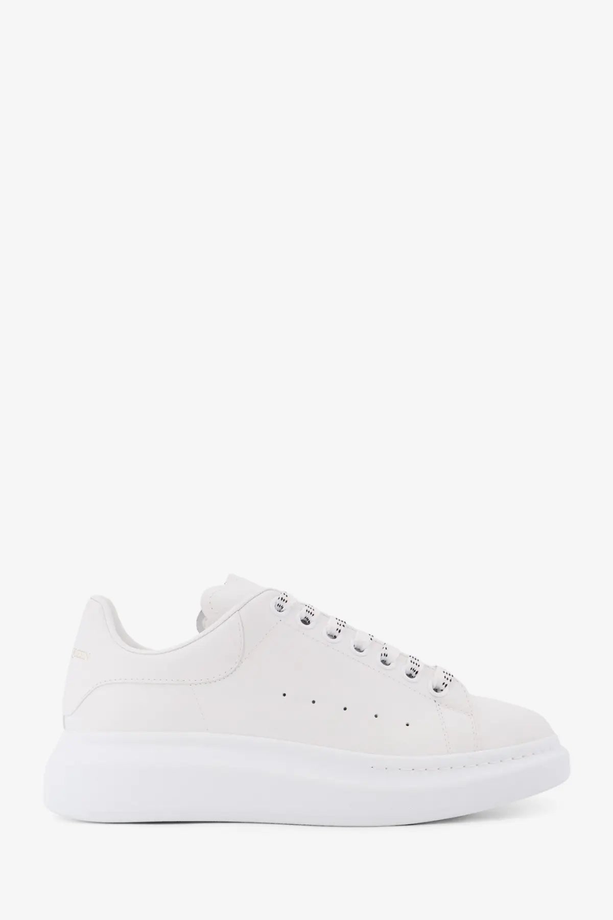 Alexander McQueen men’s low top white leather sneaker with chunky sole and perforated detailing