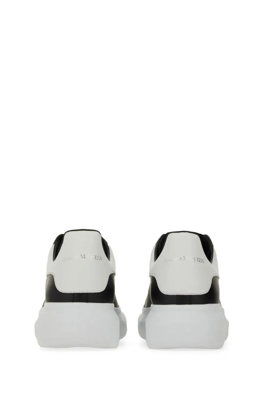 Alexander McQueen men’s oversized sneaker black with white and black leather upper and chunky sole design