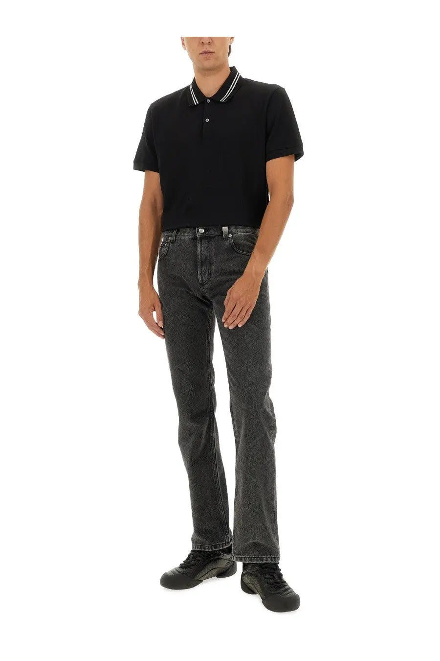 Alexander McQueen men’s black polo shirt with short sleeves and white and black striped collar trim