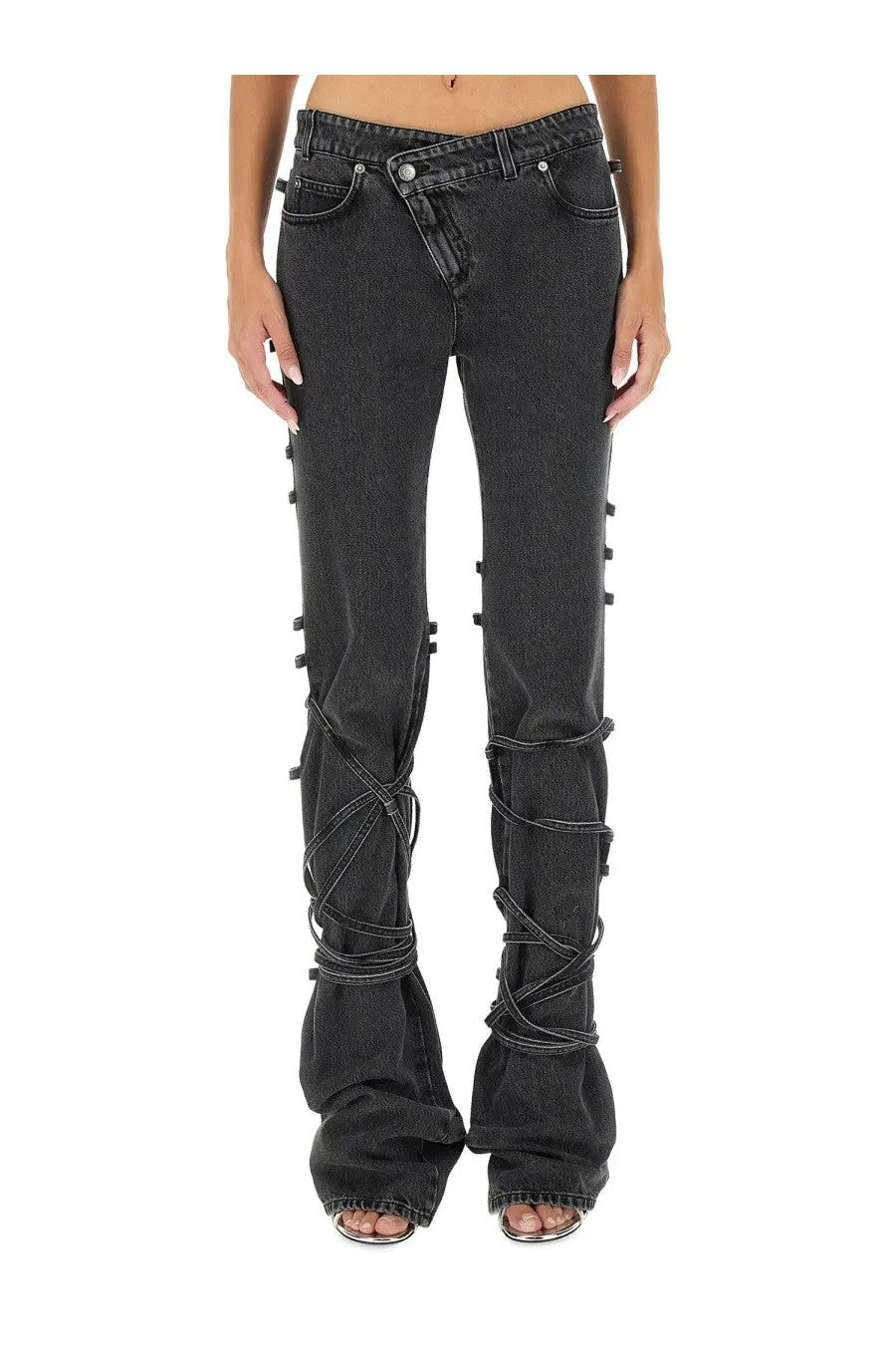 Alexander McQueen women’s black denim flare jeans with lace-up detailing along the outer legs