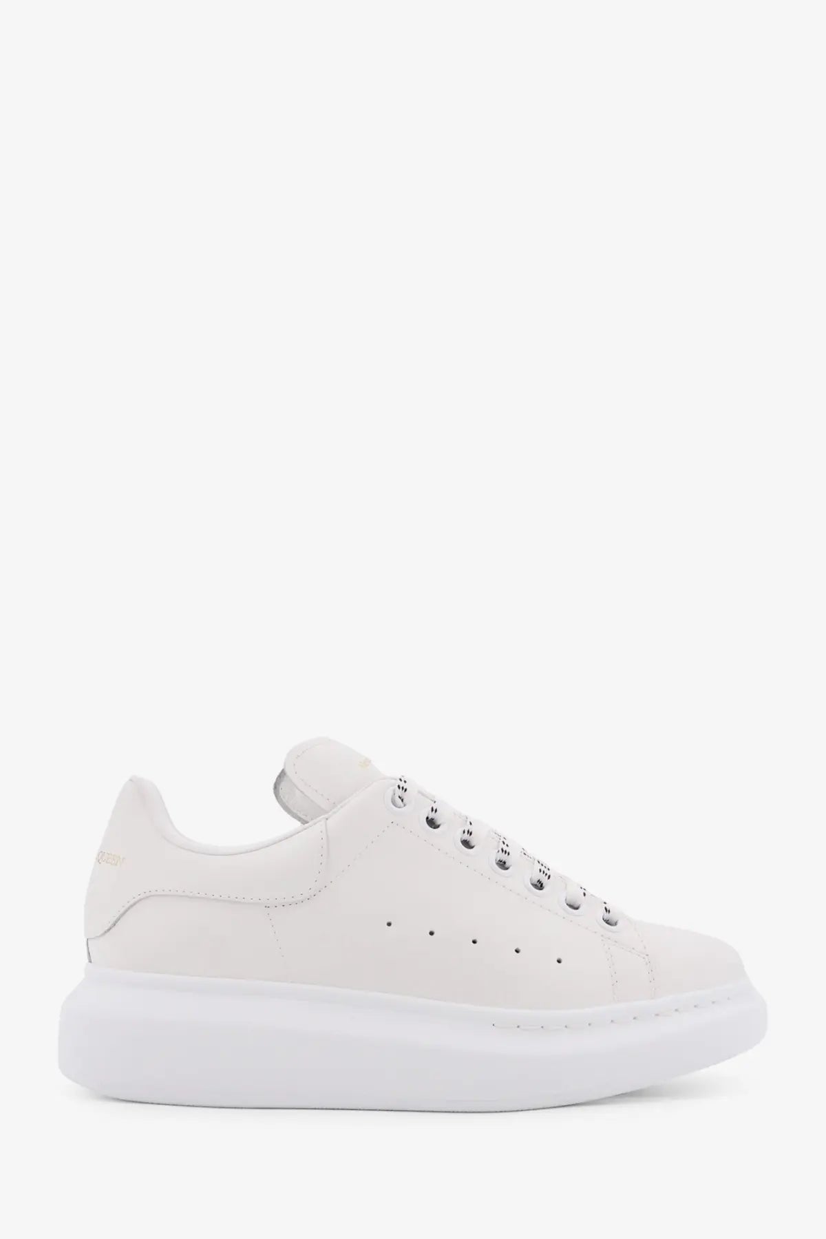 Alexander McQueen women’s oversized white leather sneakers with chunky sole and perforated detailing