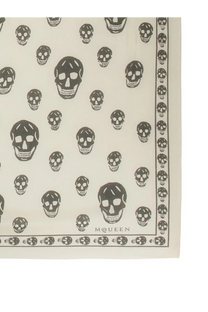 Alexander McQueen women’s cream-colored silk scarf with black skull print and border