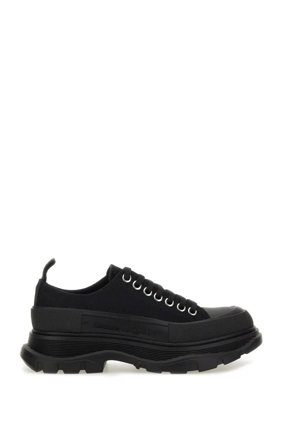 Alexander McQueen women’s tread slick sneaker black platform with chunky rubber sole and metallic eyelets