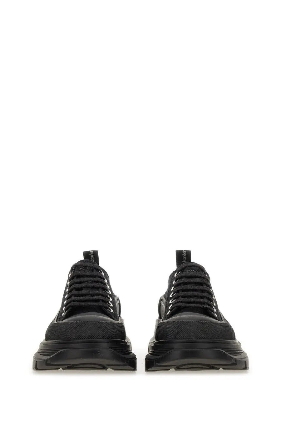 Alexander McQueen women’s tread slick sneaker black with chunky soles and lace-up design in leather material