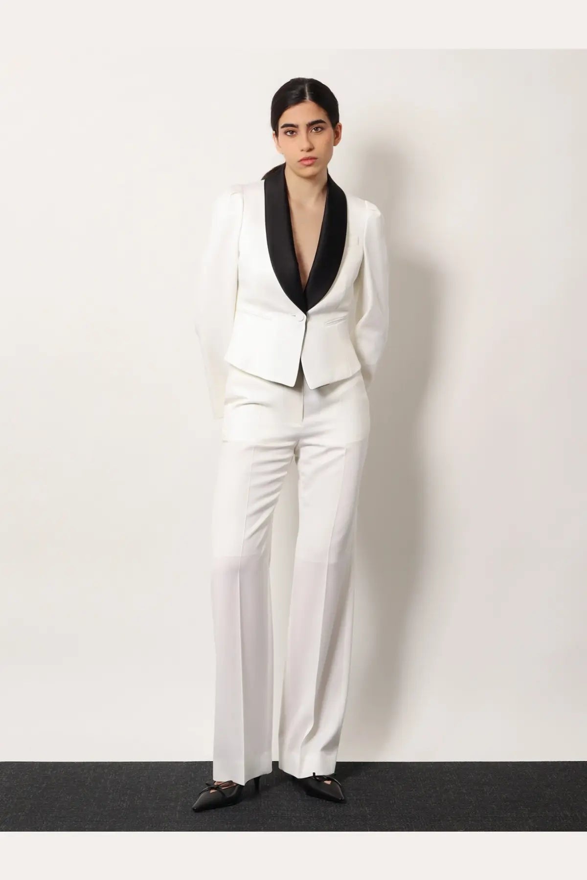 White tailored wool blazer with black satin lapels from Alexander McQueen for women shown from front view