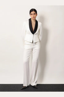 White tailored wool blazer with black satin lapels from Alexander McQueen for women shown from front view