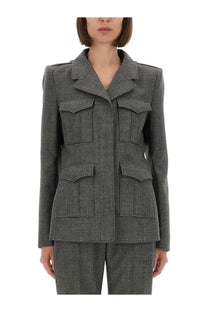 Alexander McQueen women’s charcoal-gray wool jacket with structured tweed fabric, notched collar, and four flap pockets
