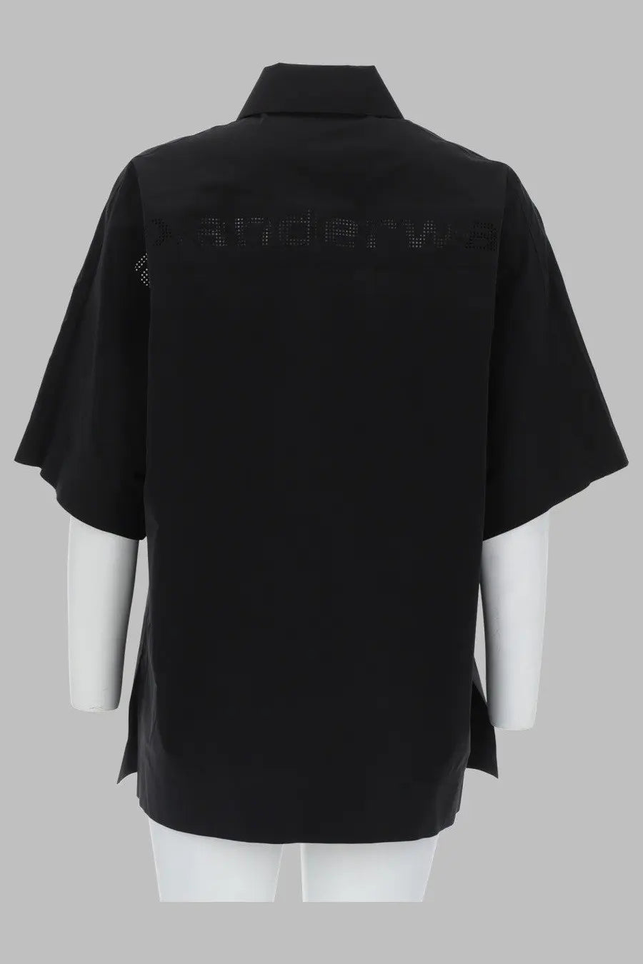 Back view of alexanderwang women’s loose fit black short-sleeved shirt with collar and subtle perforated detailing