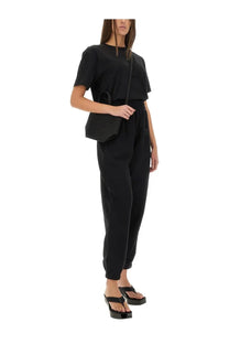 Black minimalist crossbody bag with structured silhouette and top handle from alexanderwang women’s essential shirt collection