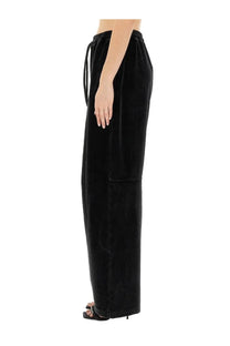 Black velvet wide-leg jogging pants with elastic waistband and drawstring by alexander wang for women