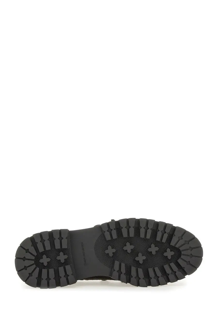 Black rubber sole with rugged textured tread and embossed cross motifs on alexanderwang womens moccasin carson brown