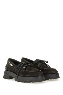 Alexanderwang women’s black suede moccasin boat shoes with chunky rubber soles and silver eyelets