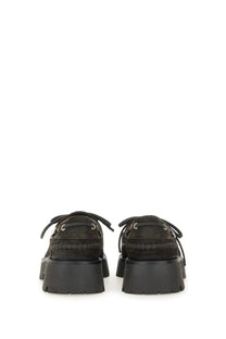 Black suede alexanderwang women’s moccasin loafers with chunky soles and silver eyelets in Carson brown