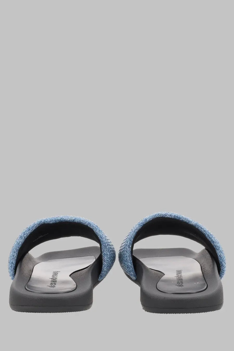 Alexanderwang women’s sandalo slide in denim blue with blue denim texture and black rubber soles
