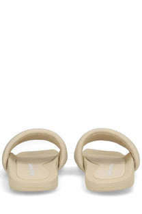 Beige alexanderwang women’s slip on slippers with textured padded strap and matching sole in pink tone