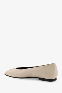 Beige leather ballet flat with black sole and rounded toe from alohas women’s katia leather ballerinas white collection