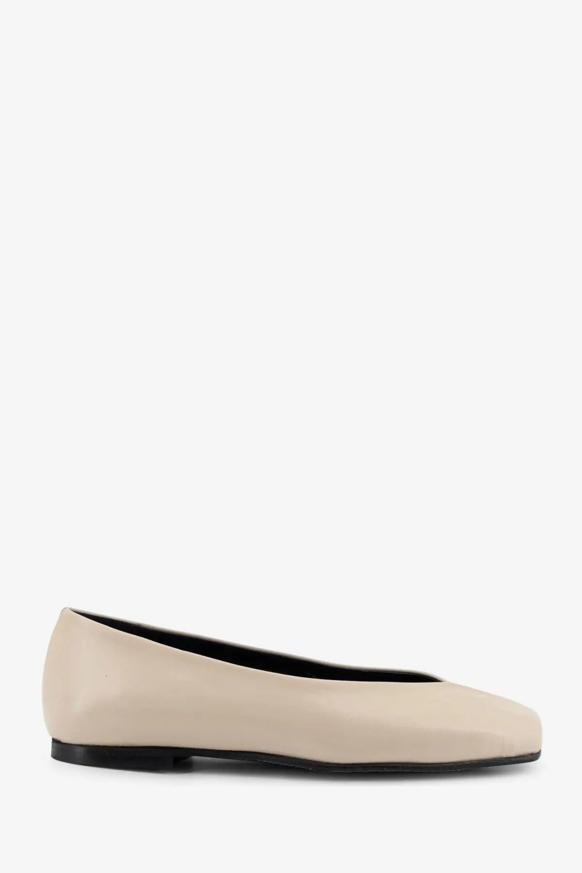 Cream-colored leather Alohas women’s Katia ballet flat with sleek minimalist design and black sole
