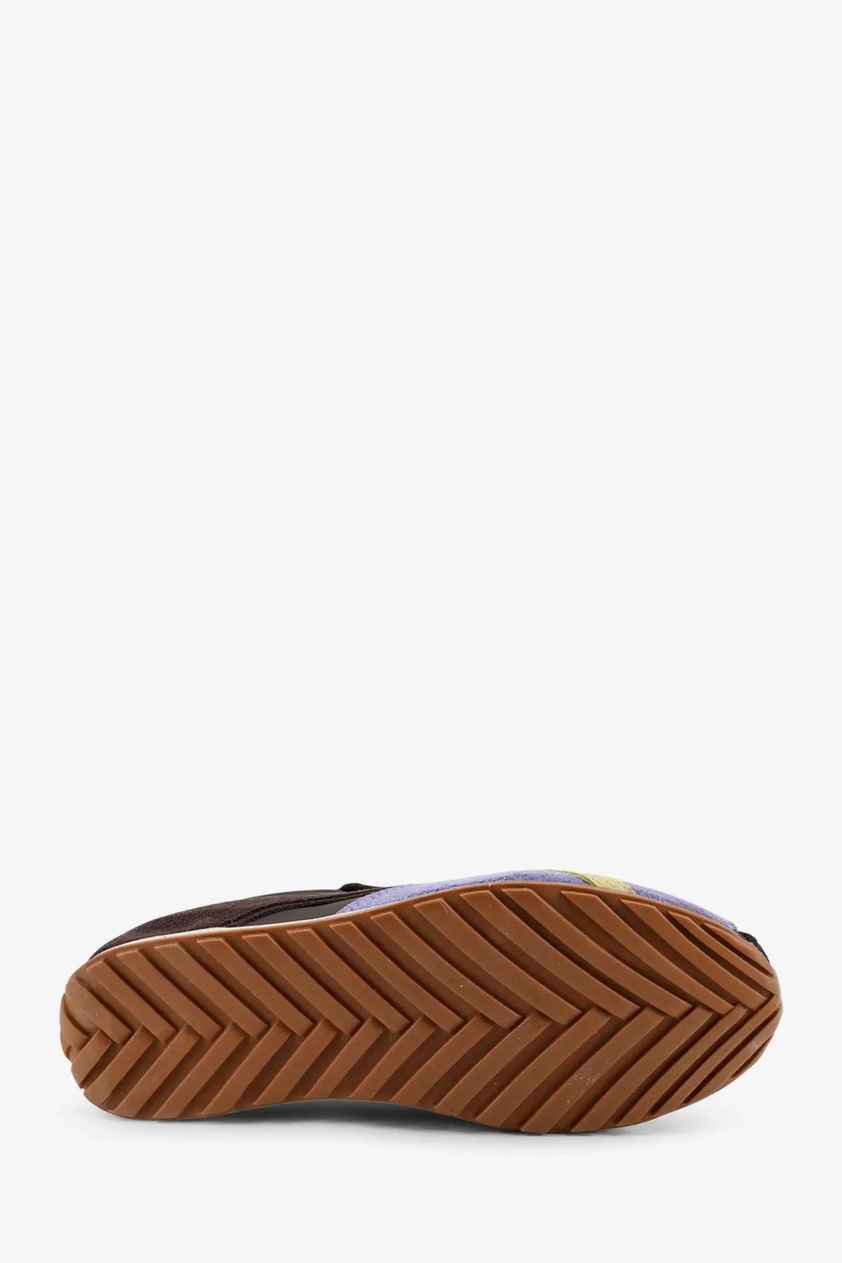 Brown rubber sole with chevron tread pattern on alohas women’s leather and suede sneakers brown