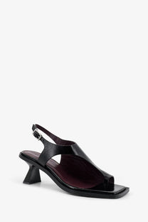 Alohas women’s Mahina black leather sandal with square toe low block heel and adjustable ankle strap shown from front