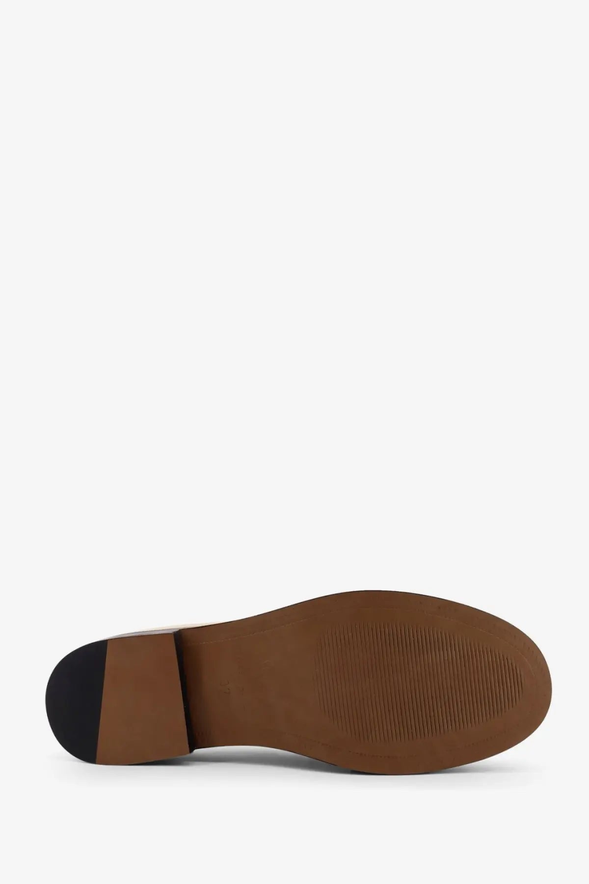 Brown leather sole with black rubber heel and textured grip on the back side of alohas women’s marietta leather loafers white