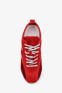 Alohas women’s red nylon and suede sneaker with white laces and a dark red heel detail