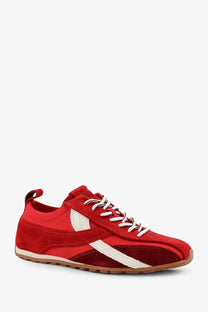 Alohas women’s red nylon and suede sneaker with white stripes and laces showcasing a casual sporty design