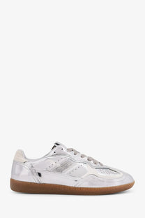 Alohas women’s rife metallized leather sneaker in silver with a glossy finish perforated panels and tan rubber sole