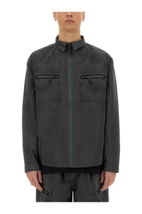 Alpha Industries men’s laser cut shirt grey featuring a dark gray technical jacket with mesh panels and black zipper accents