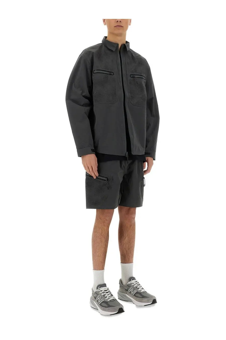 Alpha industries men’s laser cut shirt grey featuring a dark gray utility jacket with black zipper accents and chest pockets