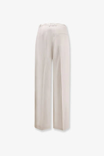 Alysi women’s cream-colored wide-leg trousers with sleek tailored fit and subtle pleats in lyocell and linen gesso