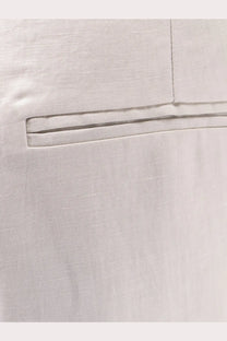 Light gray alysi women’s lyocell and linen trousers with a neatly stitched back pocket and clean precise seams