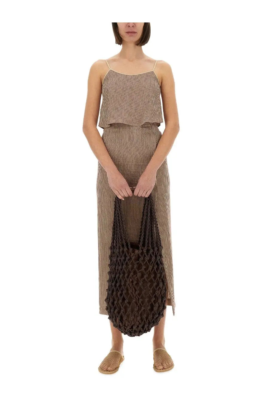 Brown macramé tote bag with woven textured pattern and soft slouchy silhouette paired with a red alysi micro stripe top
