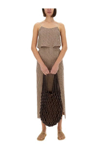 Brown macramé tote bag with woven textured pattern and soft slouchy silhouette paired with a red alysi micro stripe top