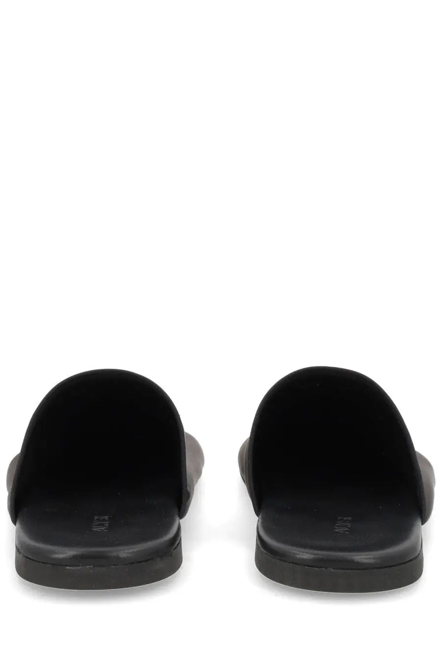Alysi women’s mule slide sandals in black suede with minimalist design and subtle branding on the insole