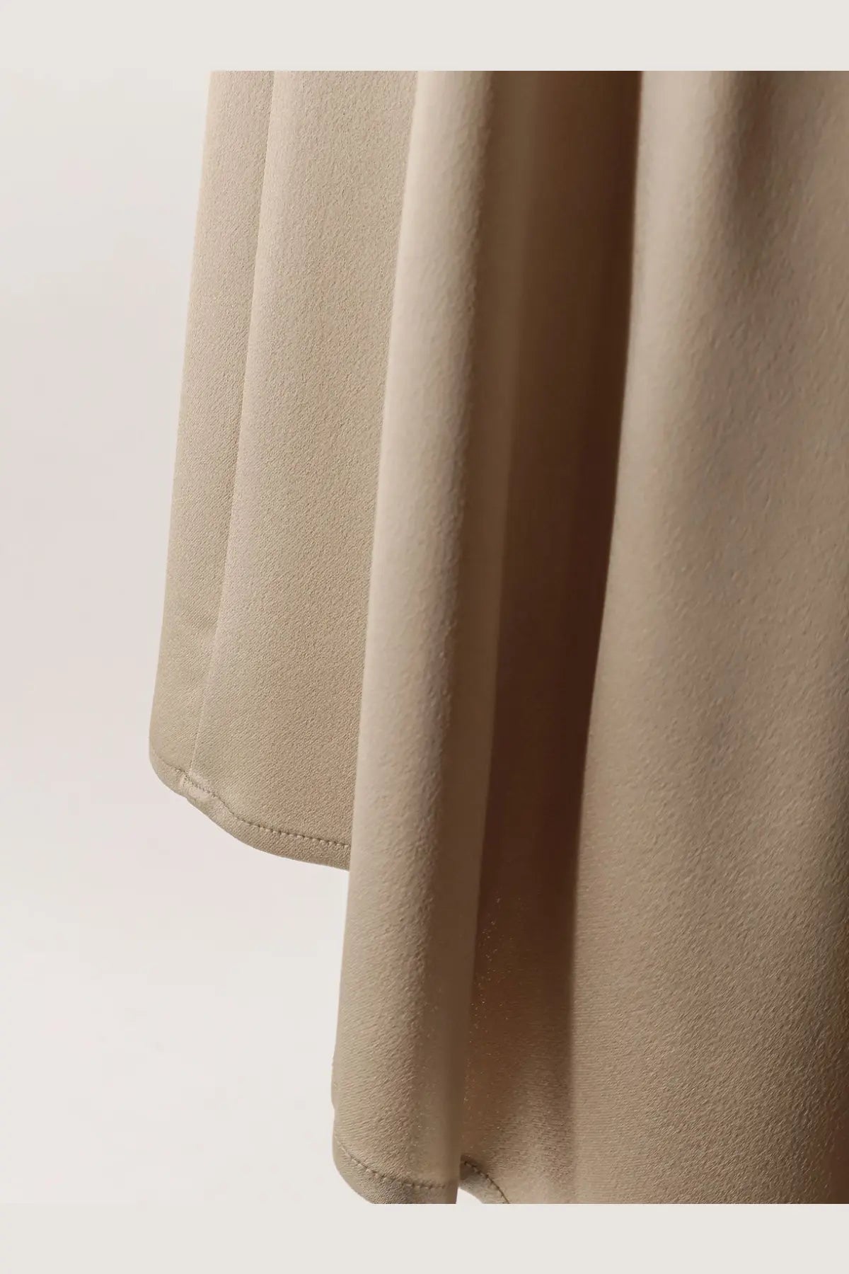 Alysi women’s beige satin skirt with smooth flowing drape and neatly stitched hem perfect for elegant wear