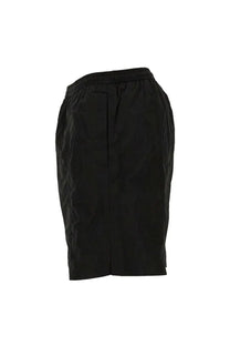 Black pencil skirt with elastic waistband and tailored silhouette paired with ami paris men’s boxer swimsuit black