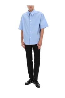Ami Paris men’s light blue short-sleeved cotton shirt with classic collar and white buttons