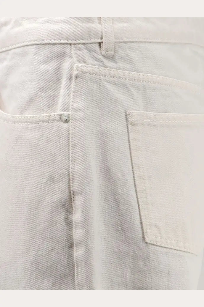 Ami paris men’s white cotton trousers in light-wash denim with subtle faded texture and classic stitching