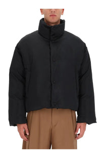 Black Ami Paris men’s Ami DE Coeur down jacket with high collar and front button closure in puffer style