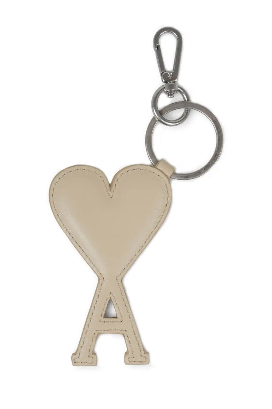Beige leather heart-shaped keychain with a lowercase a and silver metal hardware from Ami Paris mens Ami DE Coeur collection