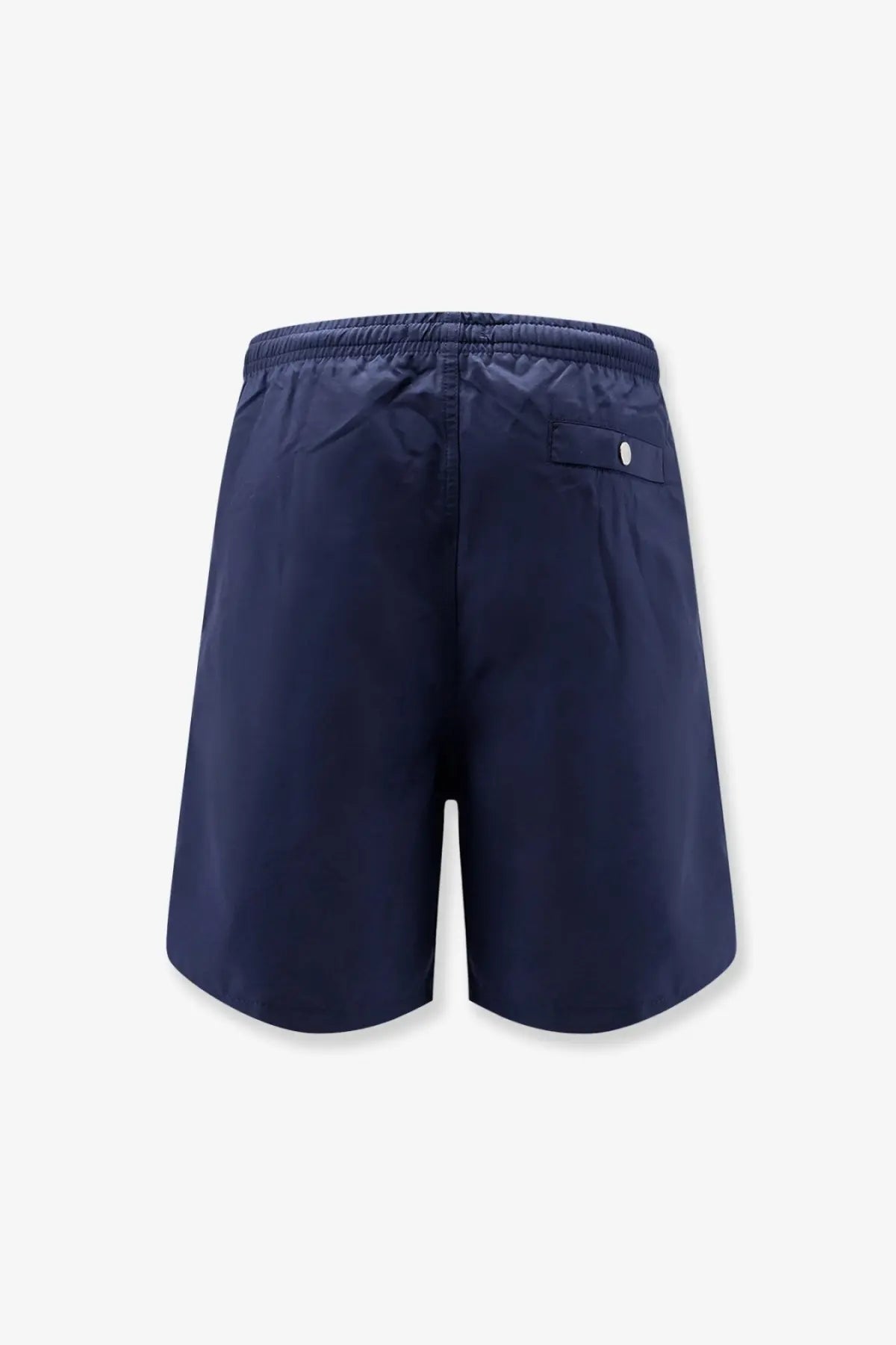 Navy blue nylon ami paris men’s swimsuit with elastic waistband and small back pocket shown from the back side