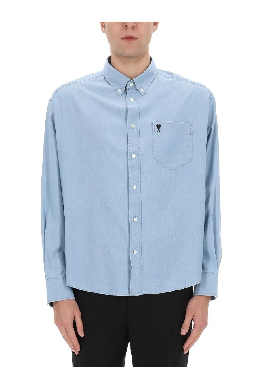 Ami Paris men’s light blue button-down shirt with subtle embroidered logo on chest pocket suitable for casual wear