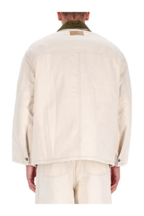 Ami Paris men’s worker jacket in beige denim with contrasting olive green corduroy collar and subtle stitching details