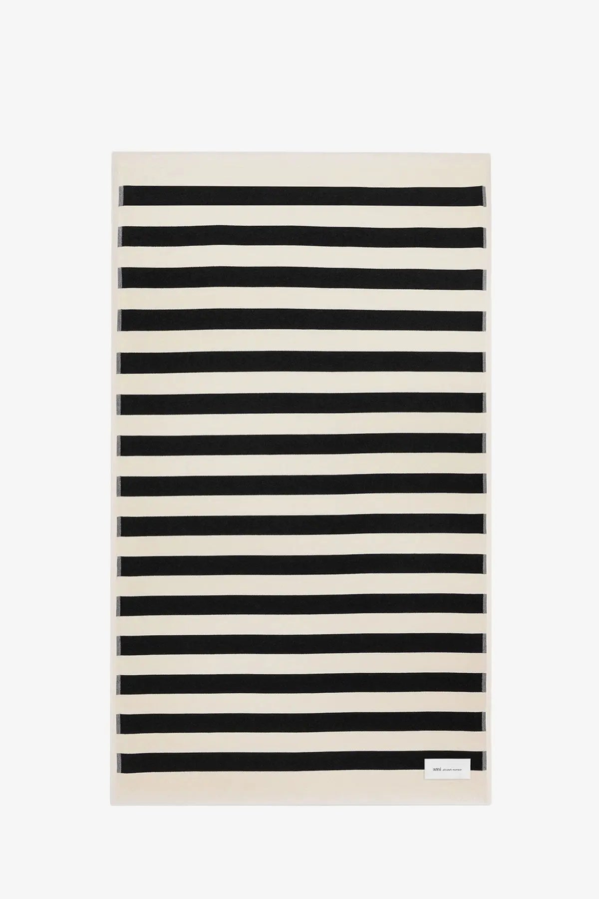 Ami Paris unisex cotton beach towel with bold black and cream horizontal stripes rectangular design
