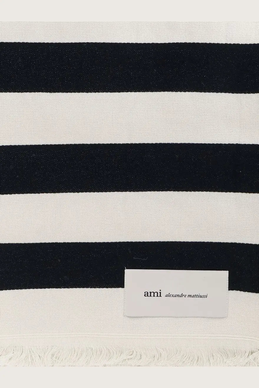 Ami paris unisex cotton beach towel black with black and white stripes and fringed edge featuring ami alexandre mattiussi label