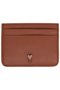 Ami Paris unisex brown leather card holder with a subtle heart-shaped logo embossed at the center