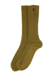 Olive green ribbed knit unisex high socks by ami paris with a small black heart logo on the cuff