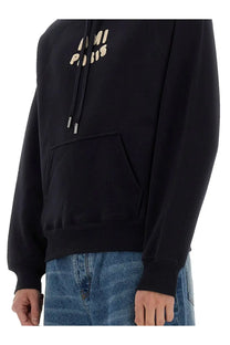 Black miu miu paris hoodie with gold embroidered logo and silver drawstring toggles in ami paris unisex blue style